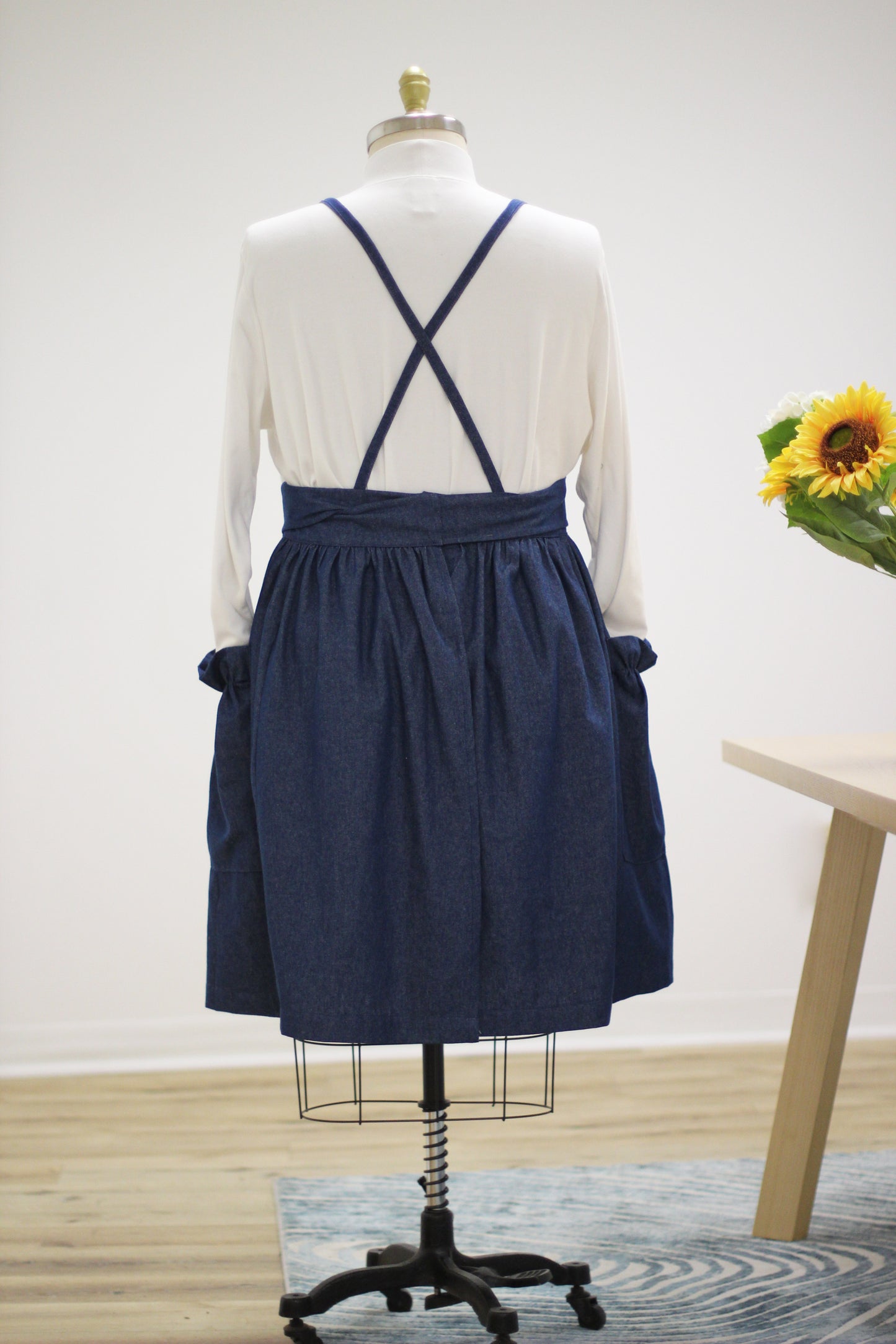XS-5X Gathered Bib Apron in Denim - back view showing the crisscross straps