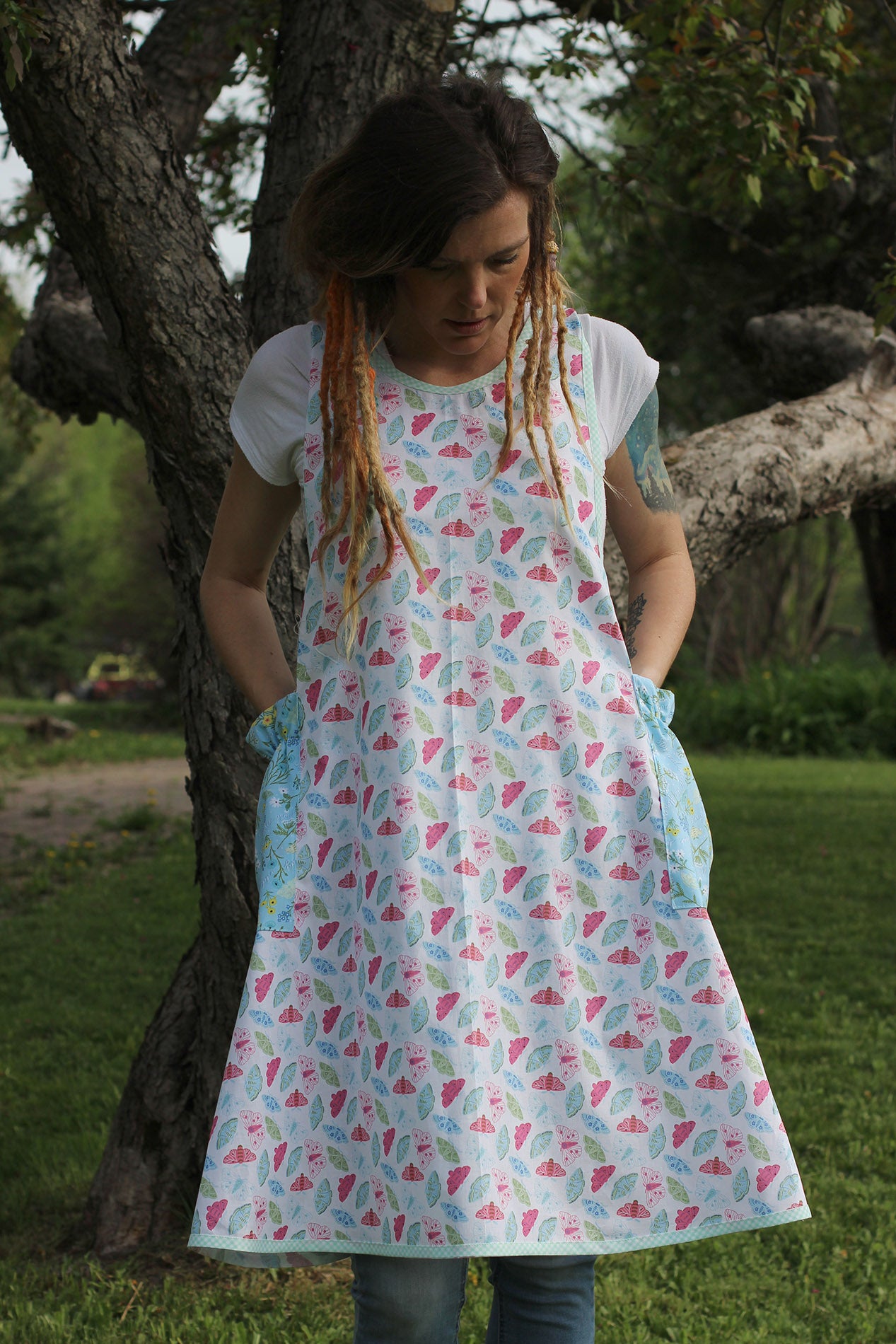 No Tie Apron in Butterflies - Front View with model showing both pockets