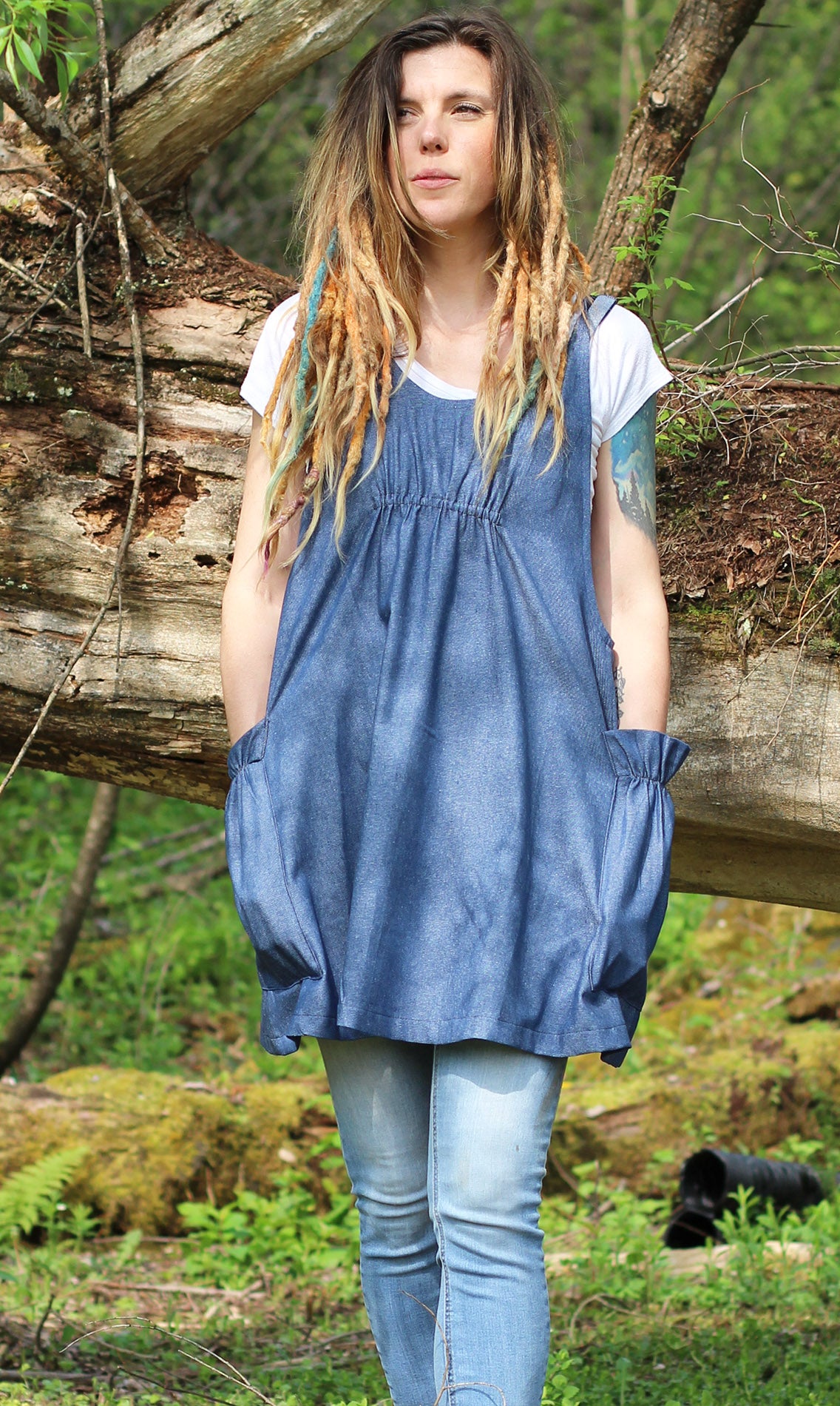 XS-5X Smock #1 in Denim - Front View with model looking into the sun.