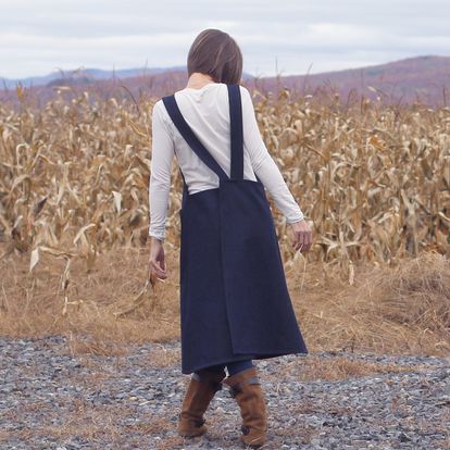 No Tie Crossback Apron in Heavy Denim - Back view with a field of corn drying in the autumn sun
