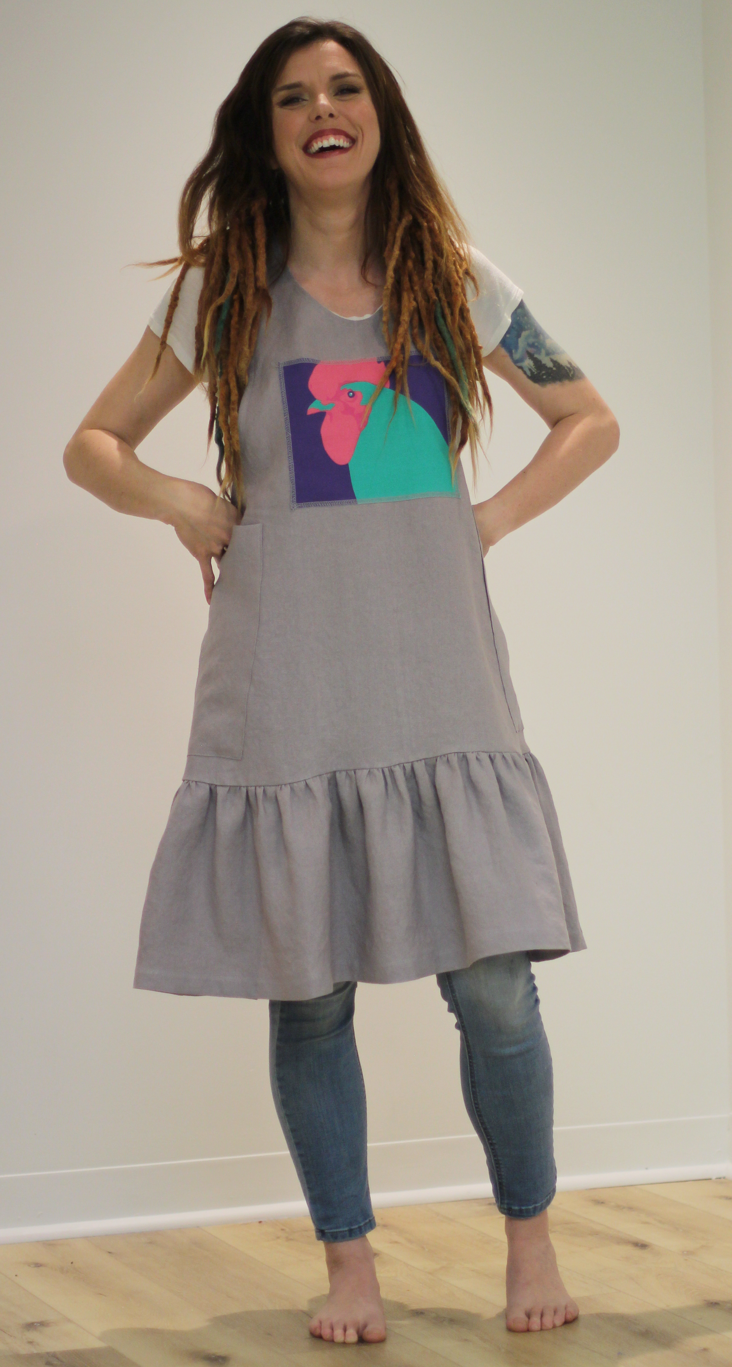 XS-5X No Tie Chicken Apron in Grey 100% Flax Linen - Front View with a happy model