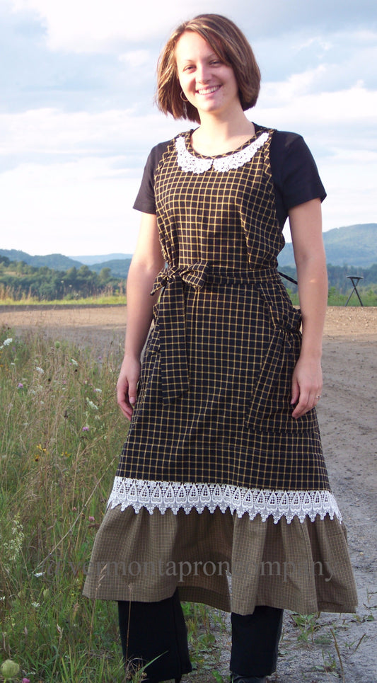 Country Hostess Apron in Black 100% Cotton Homespun with lace trim over a wide ruffled bottom, front view