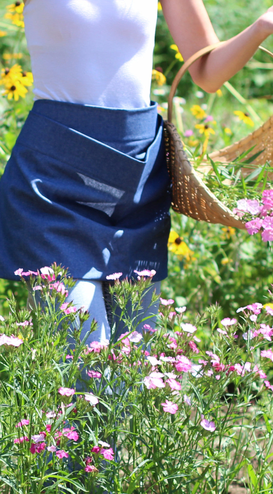 Pouch Apron in Navy Denim, front/ side view